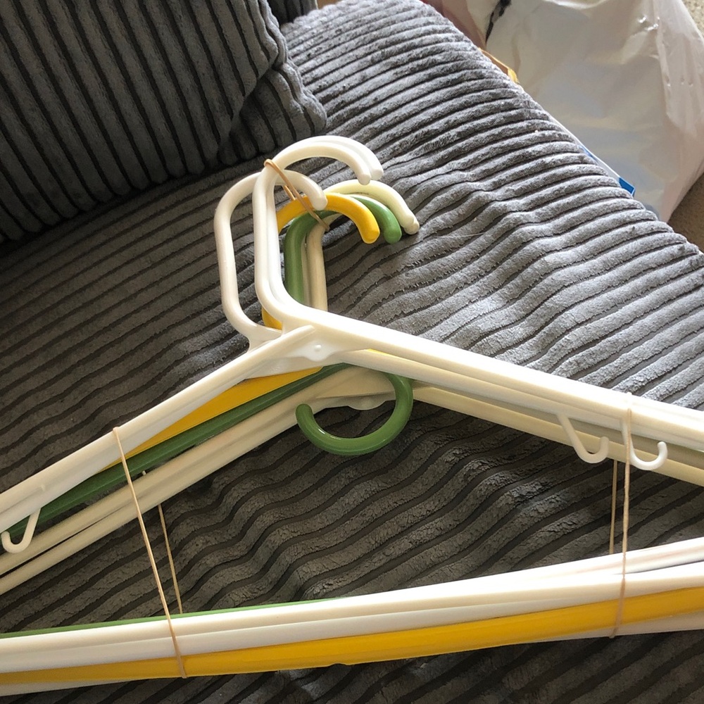 Set of Colorful Plastic Clothing Hangers - White, Yellow, Green